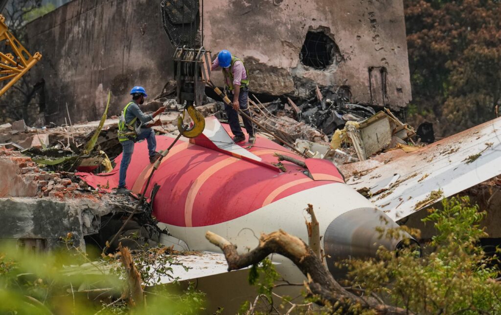 Ahmedabad plane crash: wreckage of the plane being moved